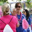 Baylor volunteers cheer on Avon walk participants during their 39 mile walk to raise awareness and money for breast cancer.
