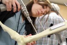 Global Surgery Fellow Dr. Rachel W. Davis gains hands on experience during an orthopedics session.