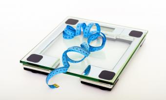 scale with measuring tape 