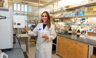 Dr. Eberlin demonstrating the MasSpec Pen in her lab