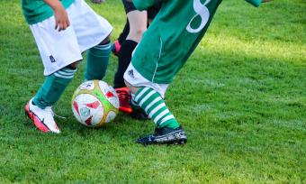 children playing soccer