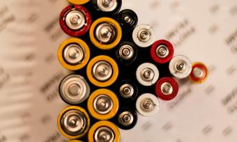 Photo of batteries staying on end in the shape of a triangle