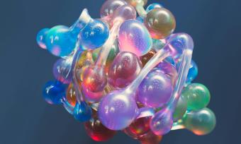 An artists rendition shows a "biological soup" of gene-regulating proteins. The current study shows that the noodle-like regions use a structured "bridge" protein to carry out gene activation.    