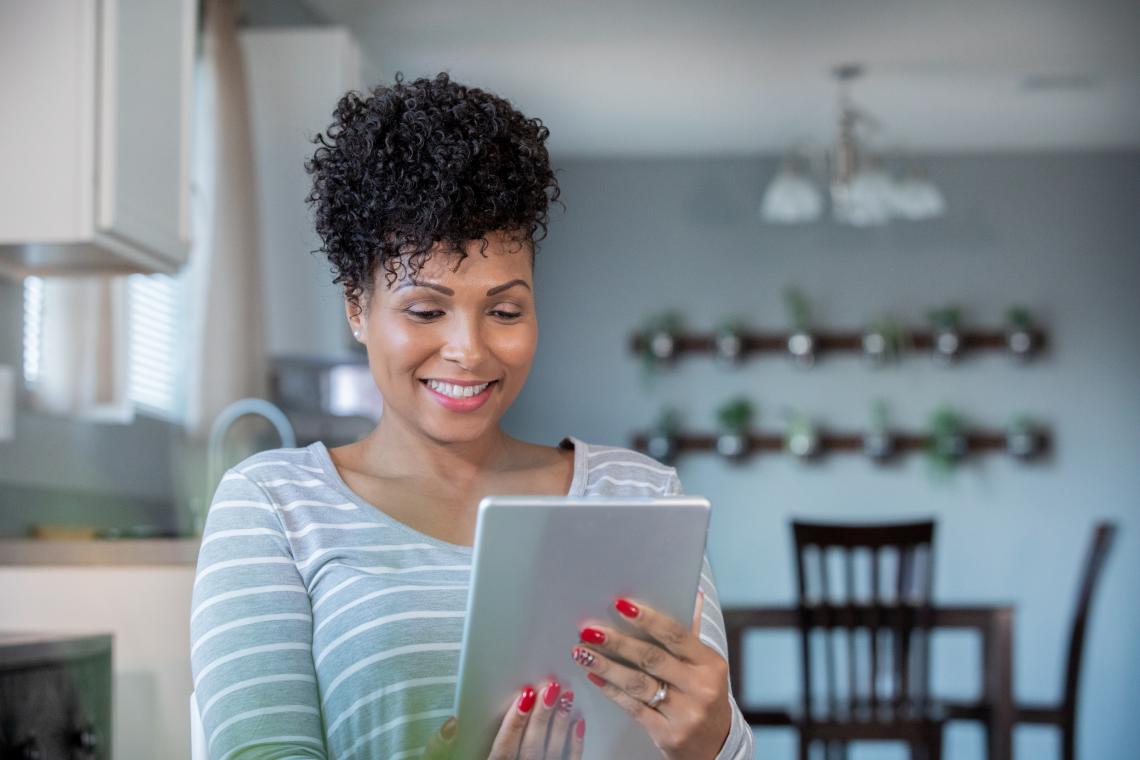 Women on tablet to call doctor