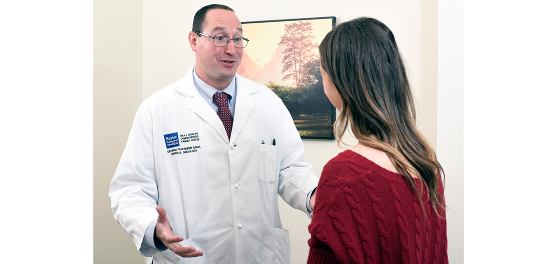 Doctor with patient discussing peritoneal cancer