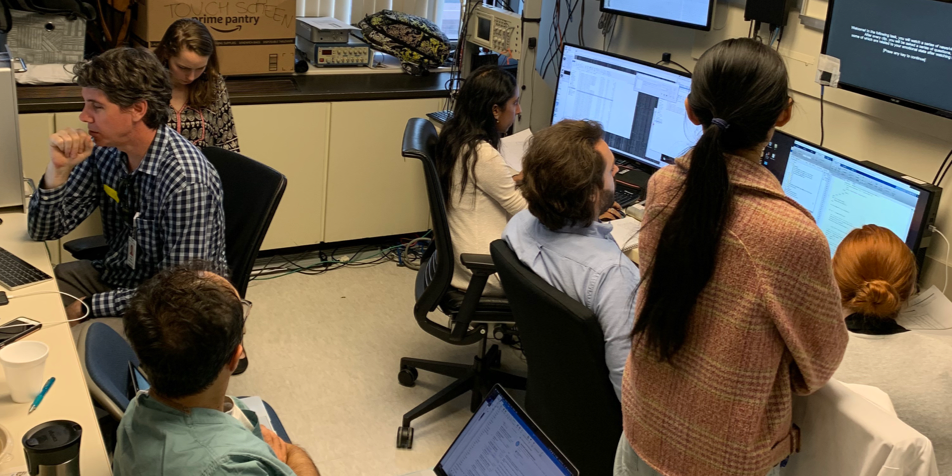A research team collecting brain and nervous system signals