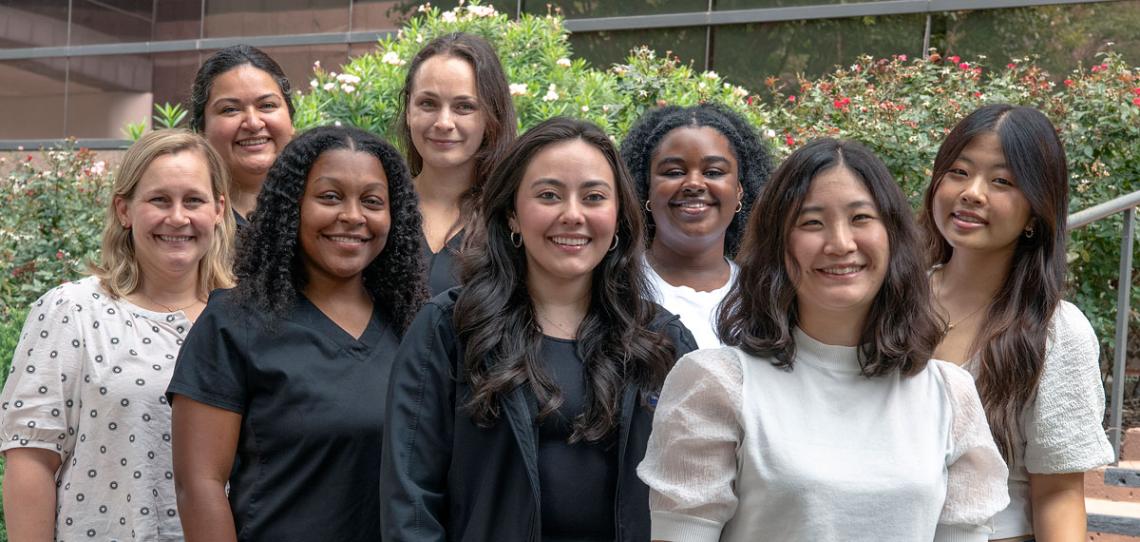 group of women standing outside