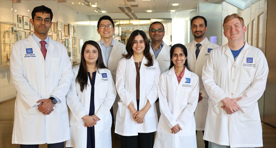group of doctors standing together smiling