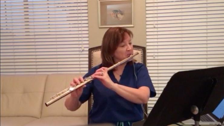 Dr. Lynn Zechiedrich playing flute