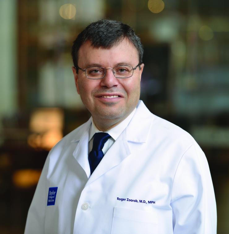 Roger Zoorob photo with white coat.