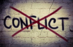 The word conflict with an X through it.