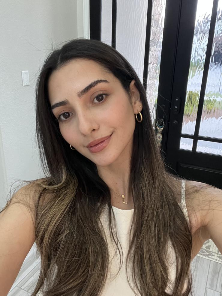 Photo of woman in front of door