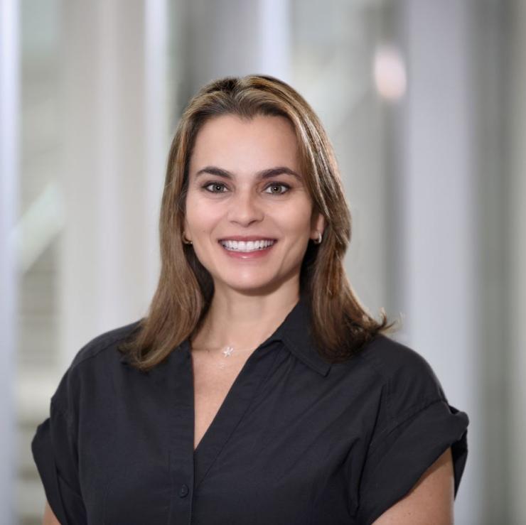 woman smiling in hallway