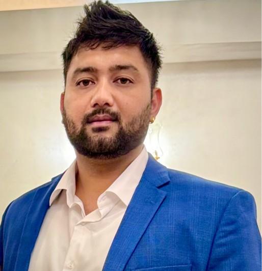 Man smiling in front of white background