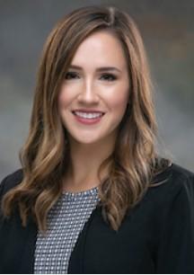 woman with shoulder length hair smiling