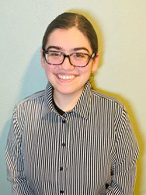 Man smiling in front of white background