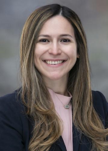 woman with highlighted hair smiling