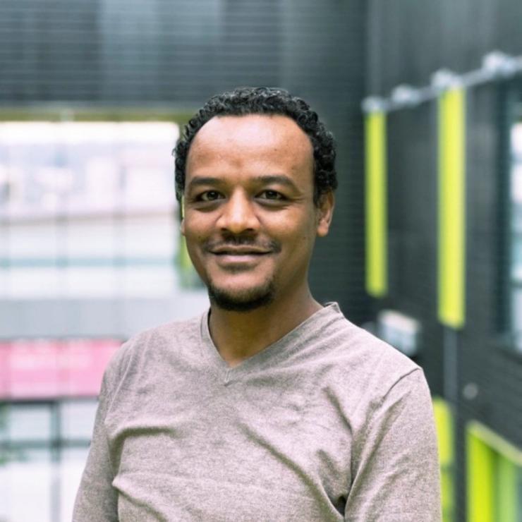 man standing in a storage room