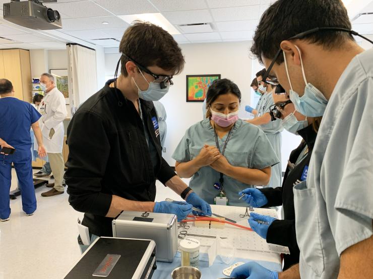Surgery residents in the SIM lab