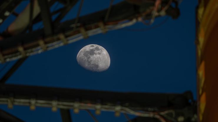 Moon Seen Shining on Full Artemis II Stack at Launch Pad 39B