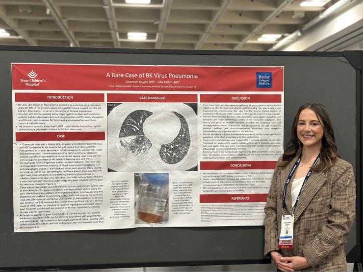 pediatrics pulmonology scholar in front of research presentation