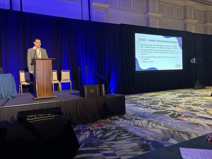 Man giving a presentation at the 2026 SIMD meeting