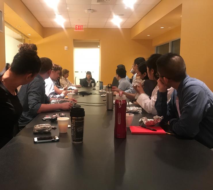 Photo of students, trainees, and faculty listening to Dr. Biykem Bozkurt at the April 2017 Tacos with Teachers