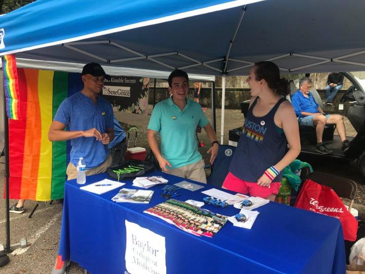 Photo of BCM Pride student leaders representing Baylor at Houston Pride Festival.