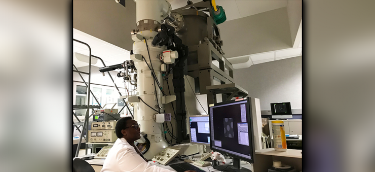 Researcher working at an electron microscope at CryoEM, one of the Advanced Technology Cores at Baylor College of Medicine.