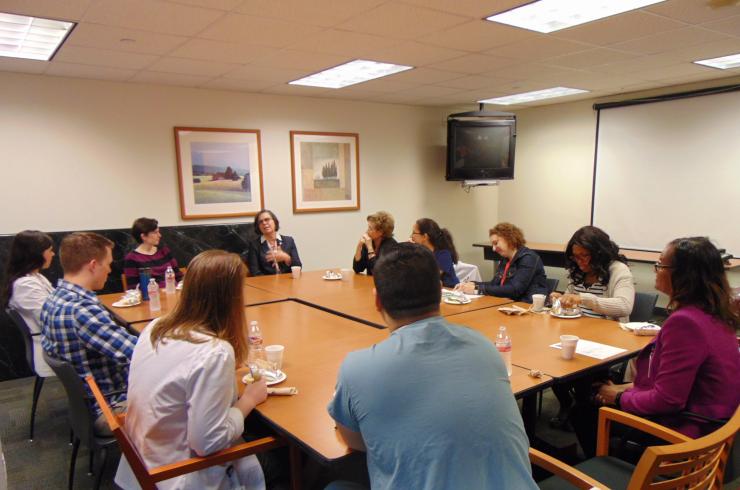 Photo of students, trainees, and faculty listening to Dr. Cynthia Peacock at the March 2017 Tacos with Teachers