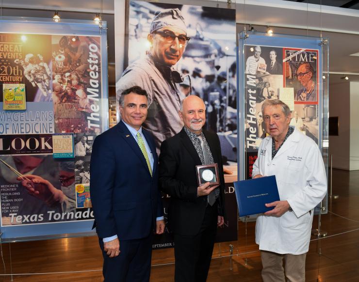Dr. Aleksandar Milosavljevic (middle) with Drs. Adam Kuspa (left) and George Noon (right).
