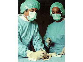 Performing a muscle biopsy.