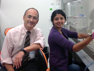 Dr. Matthew Ellis, director of the Lester and Sue Smith Breast Center at Baylor College of Medicine and post-doctoral scientist, Dr. Svasti Haricharan.