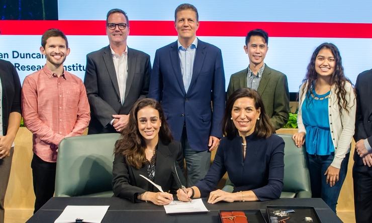 Seated: co-founder of LouLou Foundation Lynn Jafar; Dr. Huda Zoghbi. Standing: Surabi Veeraragavan, Ph.D.; Derek Reznik; LouLou Foundation chief scientific officer Daniel Lavery, Ph.D; LouLou Foundation co-founder Majid Jafar; Rodney Samaco, Ph.D.; Miranda Torres; Christopher McGraw, MD, Ph.D.