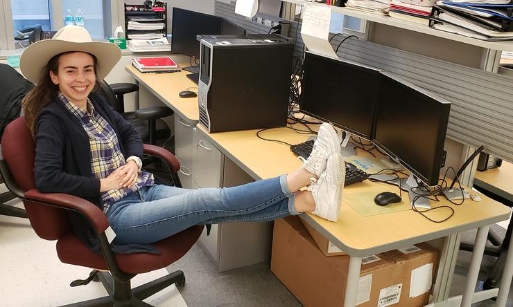 Justyna Karolak also tries on the cowboy hat for Go Texan Day 2019.