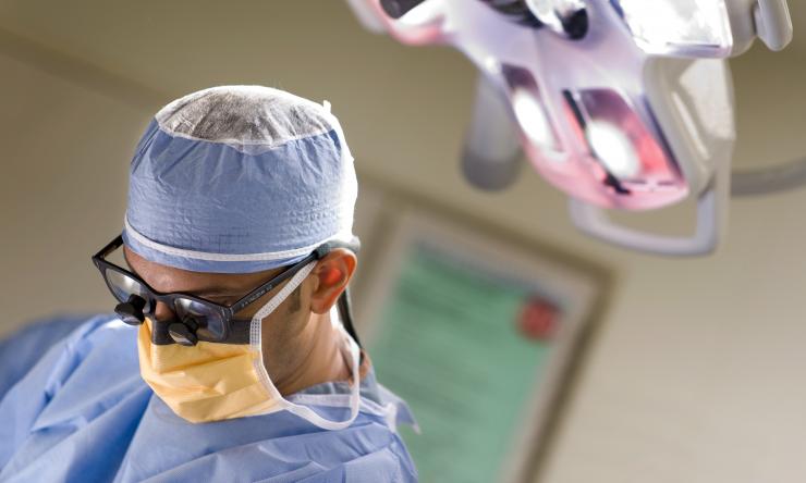 Dr, Vashdevan performing surgery at TCH