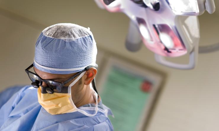 Dr, Vashdevan performing surgery at TCH