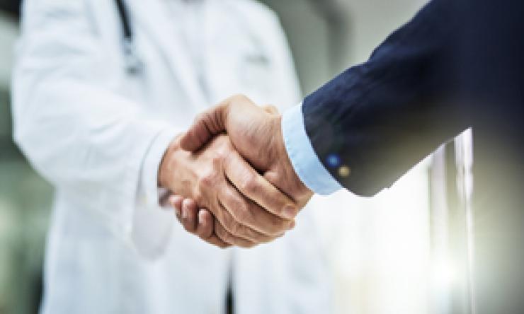 Hand Shaking with Doctor