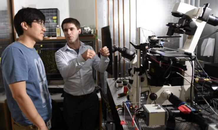 Graduate student Jihwan (James) Lee (left) and Dr. François St-Pierre in the lab.