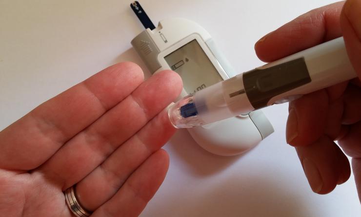 Person checking their blood sugar level