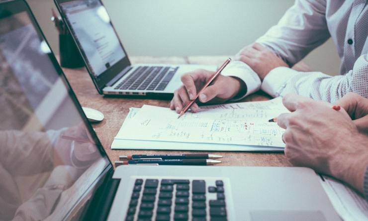 Close up of hands working in an office
