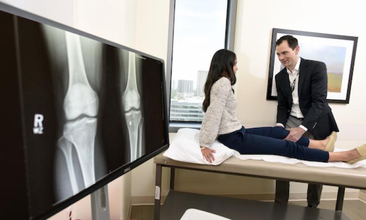 Dr. Theodore Shybut treats a patient.