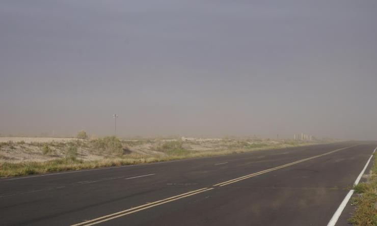 Empty road covered by haze