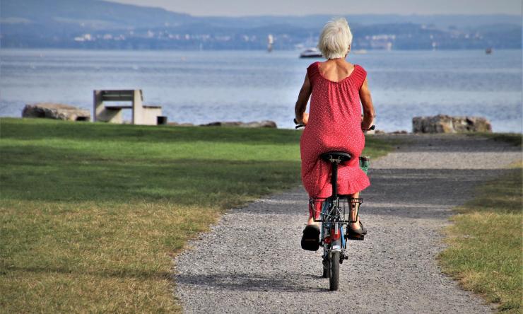 Elderly woman on bike