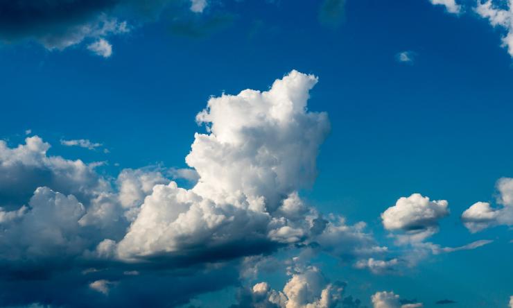 Blue sky with white fluffy clouds