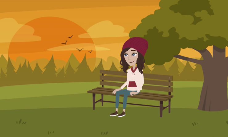 Teen Sally sitting on a bench at sunset