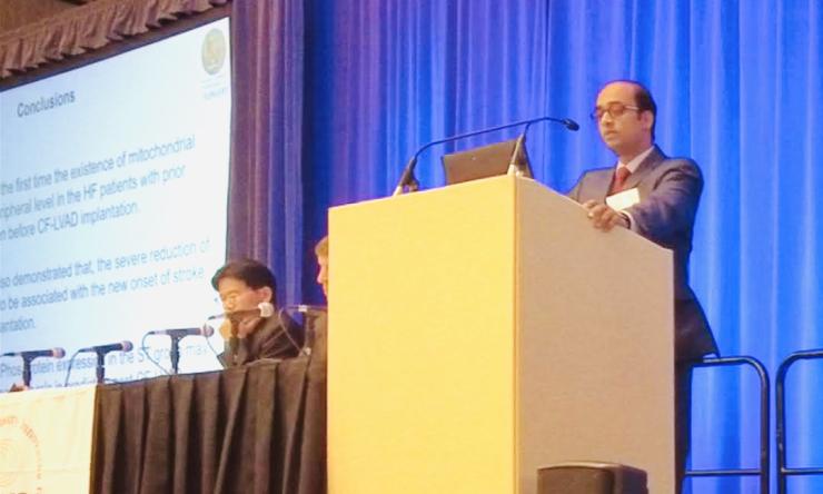 Dr. Nandan Mondal at a podium