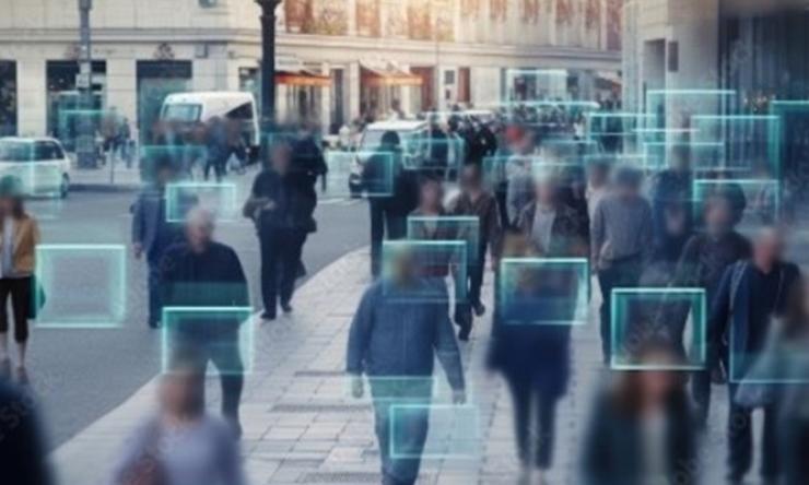 Photo of people walking on sidewalk