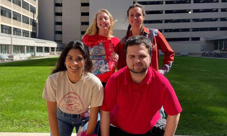 group of people smiling outside