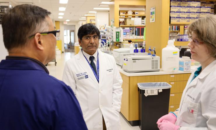 a few people in a lab